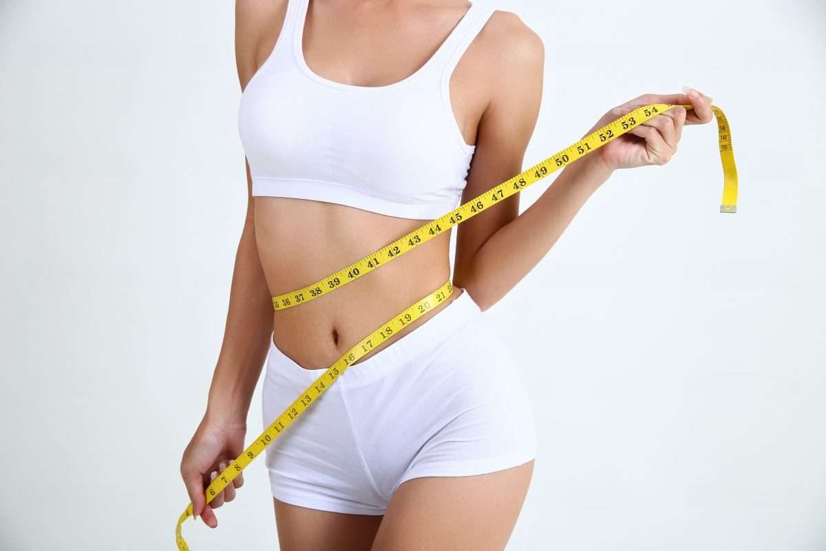 EMSlim Muscle Toning before and after body sculpting results, HIFEM technology fat reduction treatment session, Great Neck NY EMSlim clinic non invasive muscle toning procedure